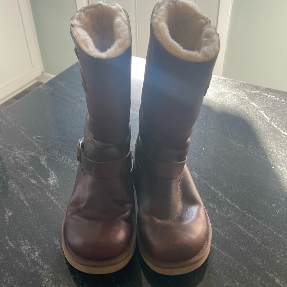 Brown leather UGG brand boots. Size 8 in women. Barley worn.